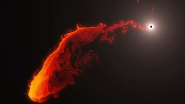 This simulation shows the future behaviour of a gas cloud that has been observed approaching the supermassive black hole at the centre of the Milky Way.