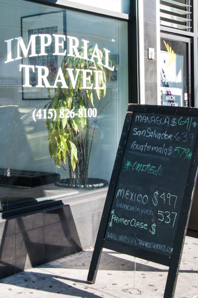 Travel agents display promos for trips to destinations all over Latin America