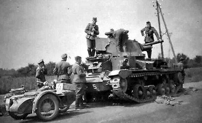 German troops examining a Cruiser Mk1 A9 tank in France 1940