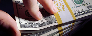 Stacks of Hundred Dollar Bills (ThinkStock)