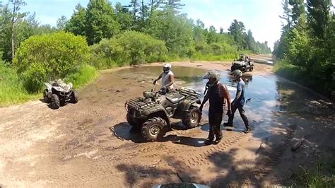 ATV trail riding and mudding in suring wisconsin - YouTube