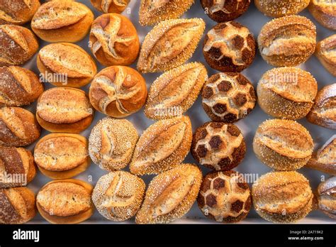 German bread rolls assortment. Diverse shapes of buns. Above view of ...