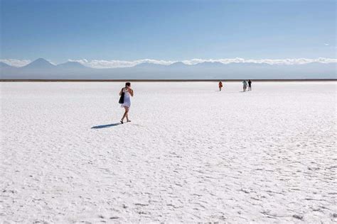 Tourists on the salt flats in the Atacama Desert | Insight Guides Blog