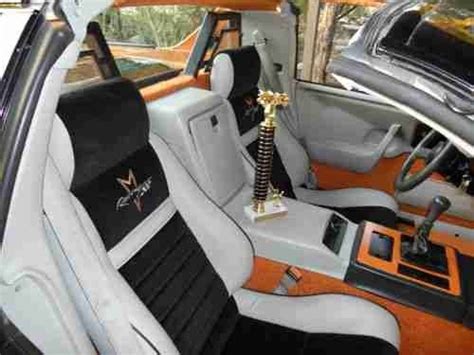 Pontiac Fiero GT interior. Likely a Mr. MIKES interior