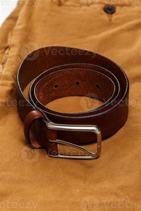 Leather brown belt 16295353 Stock Photo at Vecteezy