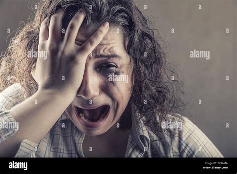 Crying girl. Closeup of a young woman desperately crying Stock Photo ...