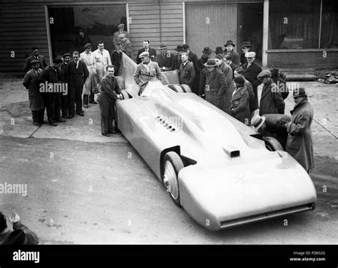 Sir Malcolm Campbell in his racing car Bluebird at Brooklands, 1935 ...