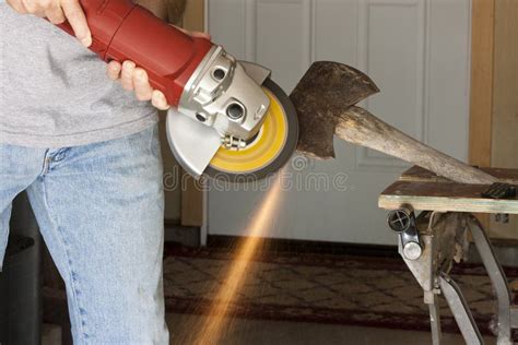 Sharpening an axe stock image. Image of danger, metal - 25864633