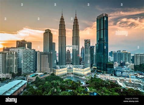 City skyline with Petronas Towers at sunset, Kuala Lumpur, Malaysia ...