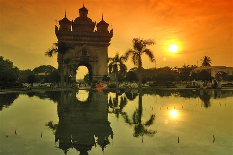 Patuxai monument in Vientiane at sunset | Vientiane, Monument, Travel