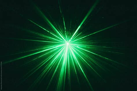 "Green Laser Beam Against Black Dark Background" by Stocksy Contributor ...