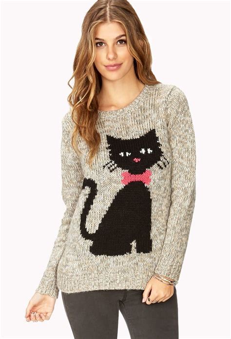 This super cute sweater is the purrfect addition to any cat-centric ...