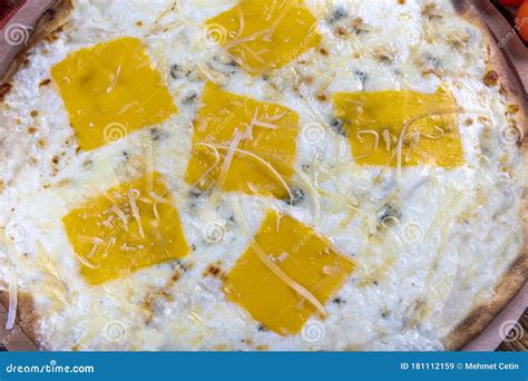 Four Types of Cheese Italian Pizza on a Wooden Floor Stock Image ...