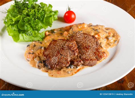 Beef with mushroom sauce stock image. Image of potato - 123412819