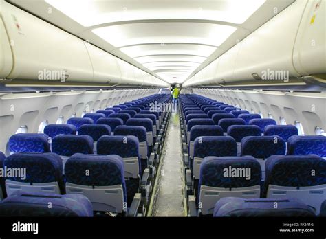 Airbus A320 cabin seats. Interior of Airbus airliner with ground ...