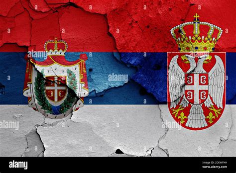 flags of traditional flag of AP Vojvodina and Serbia painted on cracked ...