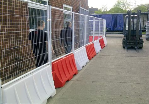 Water Filled Barriers with Fence Attachments - Buy & Hire | SafeSite ...