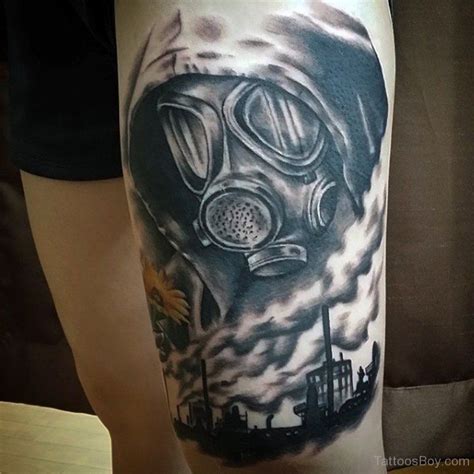 Left Thigh Grey Ink Gas Mask Tattoo | Gas mask tattoo, Tattoos for guys ...