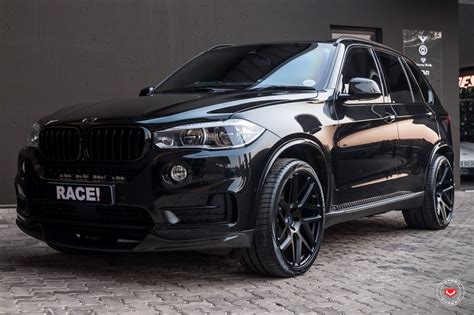 Blacked Out BMW X5 with Aftermarket Wheels