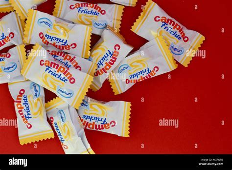 Campino boiled sweets, fruit and yogurt flavours, red background Stock ...