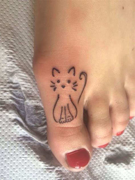 Women Tattoo - small cat tattoo... - TattooViral.com | Your Number One ...