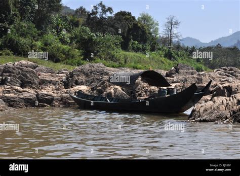 Traditional boat, Mekong river, Laos Stock Photo - Alamy