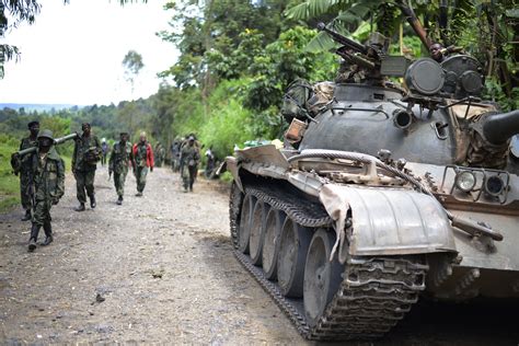 Congo's M23 rebels surrender to Ugandan military - CBS News