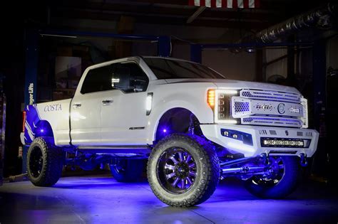 Fabtech Lifted F-250 Platinum on Fuel wheels wrapped with Nittos ...