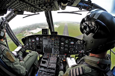 The crew of a Royal Air Force Griffin helicopter of the Defence ...