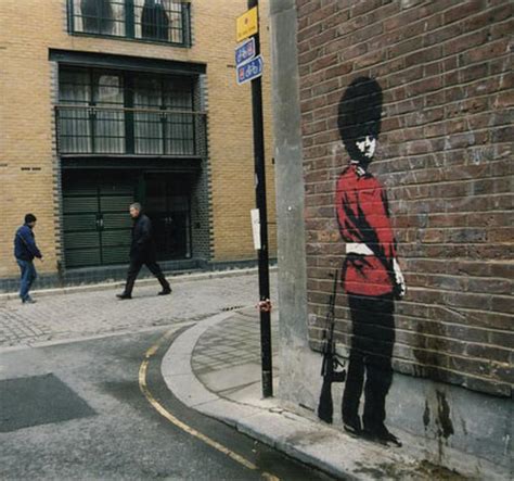 Kissing Police - The Art Of Banksy - CBS News