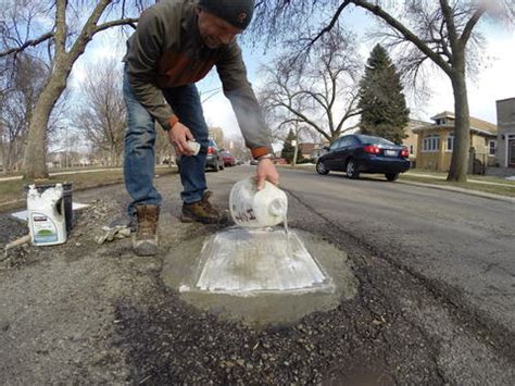 Photos: Pothole art -- Chicago Tribune