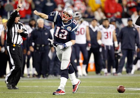 Tom Brady celebrates after running for a first... - SI Photo Blog