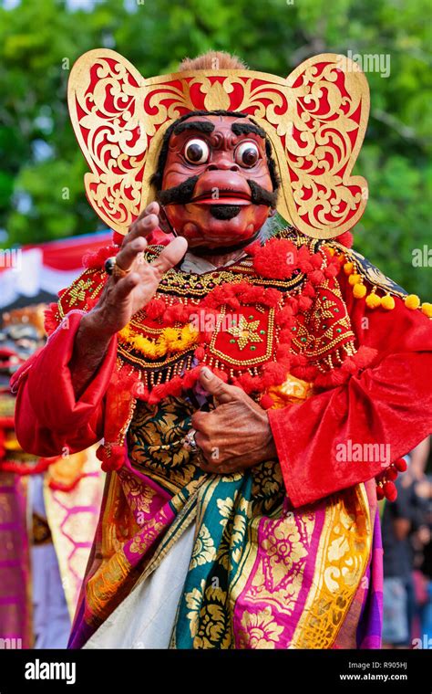 Dancer man in traditional Balinese costume, face mask Tari Wayang ...