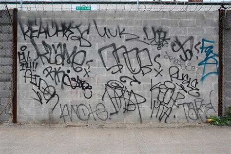 Graffiti tags. Are they considered as social tools or just vandalism?