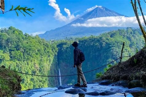 East Java's Kapas Biru Waterfall, Where Misty Cascades Meet Adventurous ...