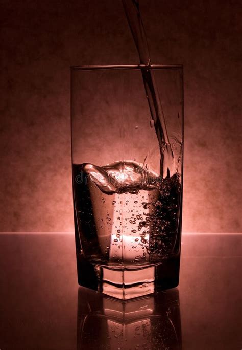 Liquid Being Poured Into Glass Stock Photo - Image of beverage ...