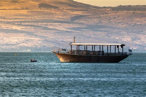 Old Boat On Sea Of Galilee In Israel At Foggy Spring Day. Stock Image ...