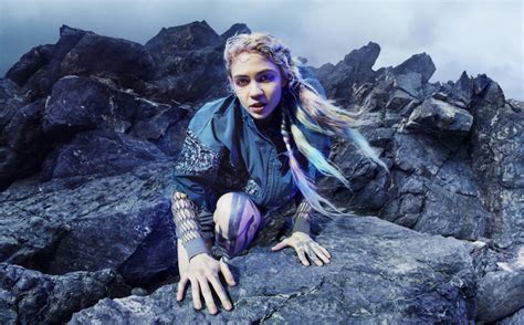 Grimes Says She Had Experimental Eye Surgery to Cancel Blue Light