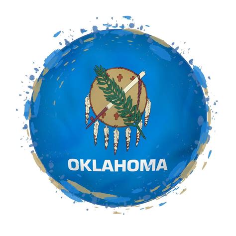 Round grunge flag of Oklahoma US state with splashes in flag color ...