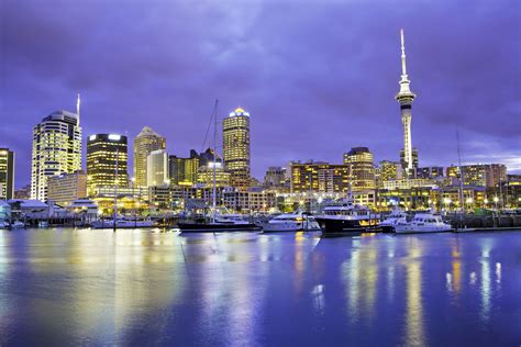 Auckland skyline with Sky Tower. Viaduct Basin – TechCrunch