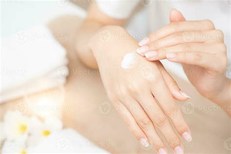 spa and treatment skin hand, Woman applying organic moisturizing hand ...