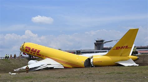 Watch: DHL cargo jet splits in two after skidding off runaway in Costa ...