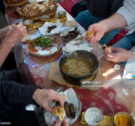 People Eating Yemeni Food At Table Saana Yemen High-Res Stock Photo ...