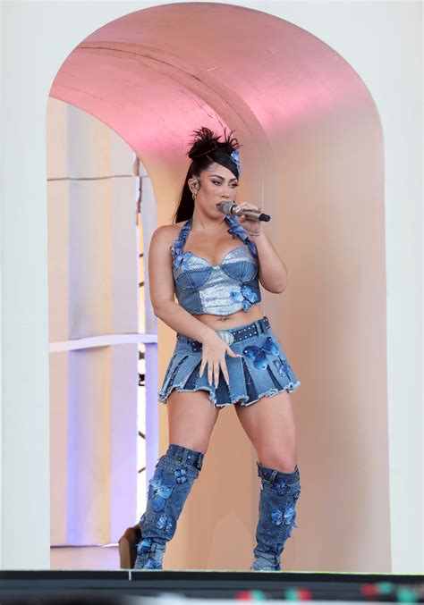 Kali Uchis Performs at Coachella 2023 in D&G Butterfly Denim Boots ...