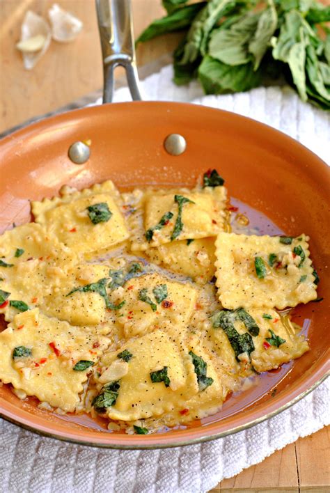 Creamy cheese ravioli sauteed in a light sauce of garlic and basil ...