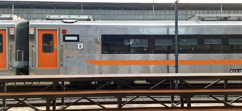 View of the Pasar Senen train station area. Local train and passengers ...