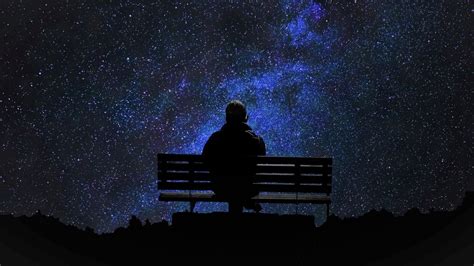 Man Is Sitting Alone On Bench Under Starry Sky During Nighttime HD ...