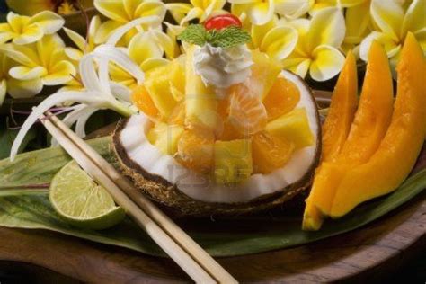 a tropical hawaiian dessert of local fruits in a coconut | Hawaiian ...