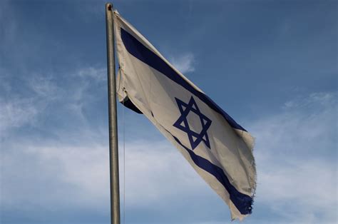 Old Israeli Flag Against Clouds Free Stock Photo - Public Domain Pictures