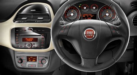 Fiat launches compact car Punto Evo @ Rs 4.55 lakh - Rediff.com Business